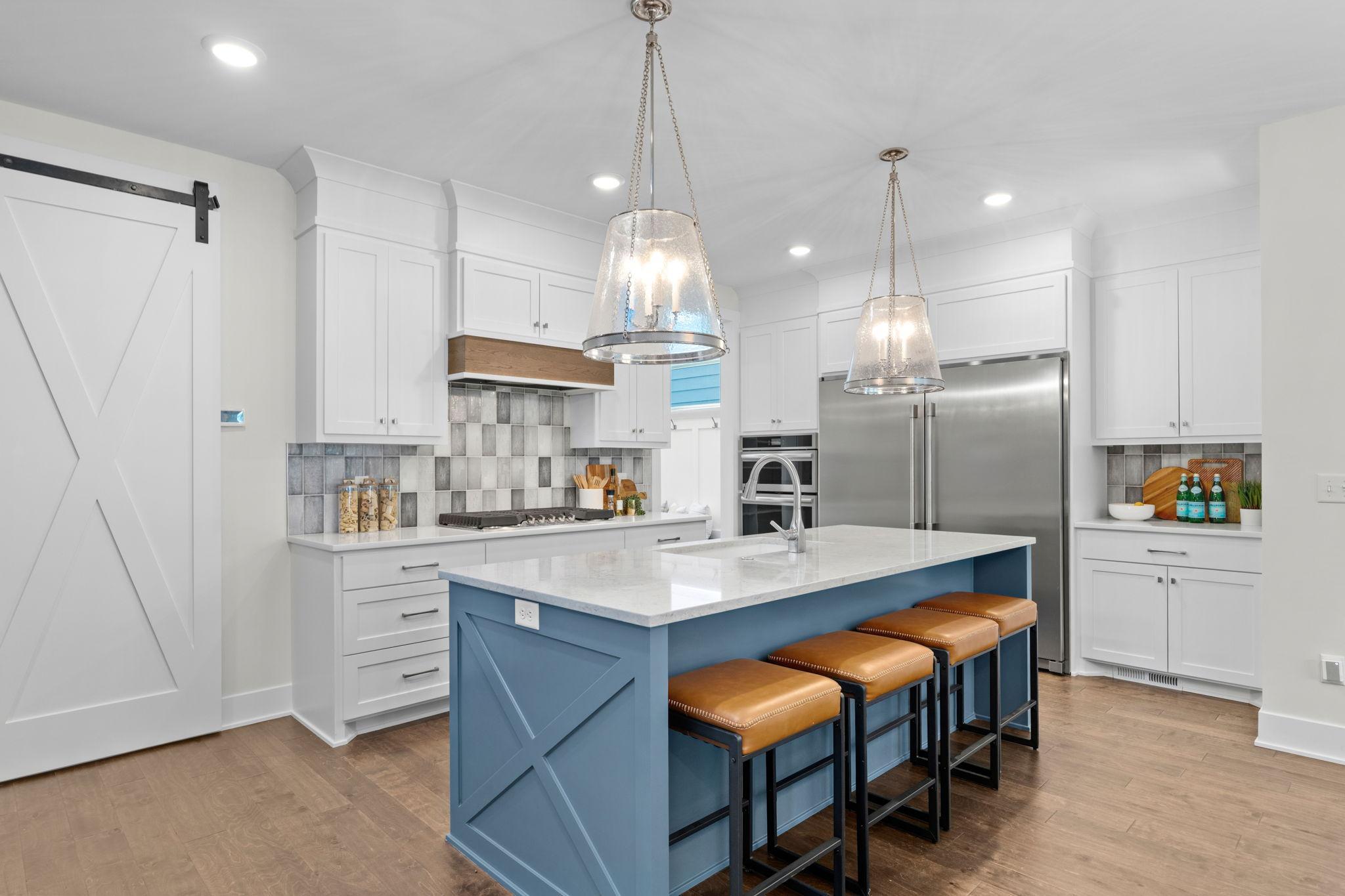 Chef's Kitchen featuring 8ft Kitchen Island, Upgraded Appliances, Custom Cabinets