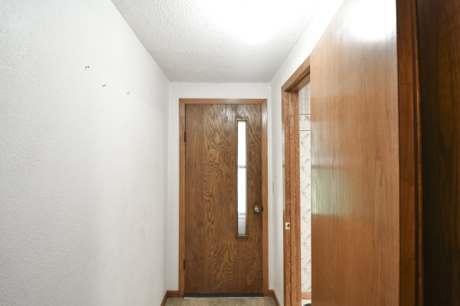 Front door entry hallway. The laundry room is off to the right. Then their is a front entry closet.