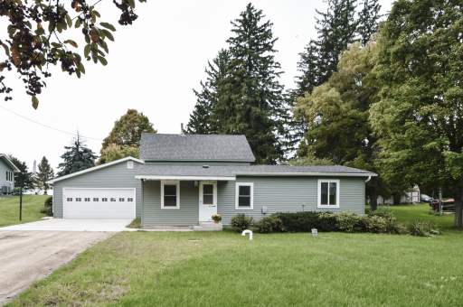 Newer roof, siding, vinyl windows, septic, garage door.
