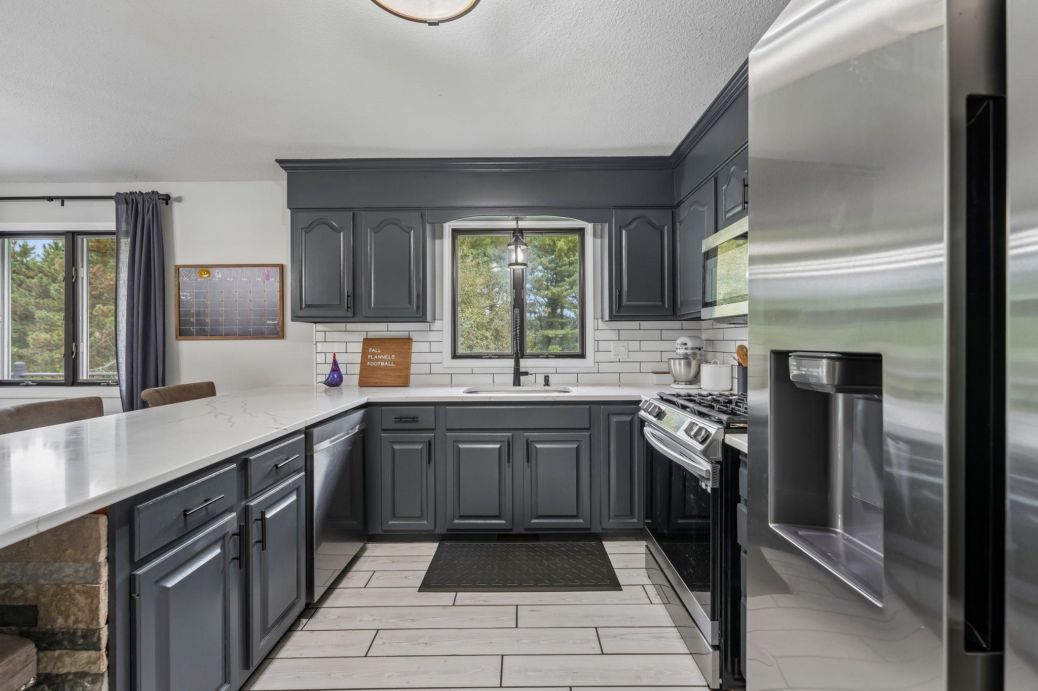 Kitchen with Quartz Countertops & LVT flooring