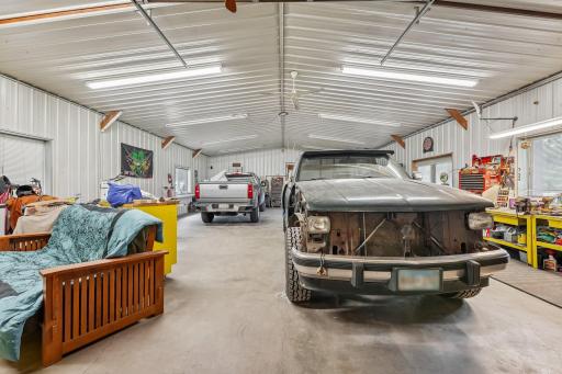 44' x 30 Insulated heated shop of the 30 x 99 pole shed with patio door leading to covered patio and windows