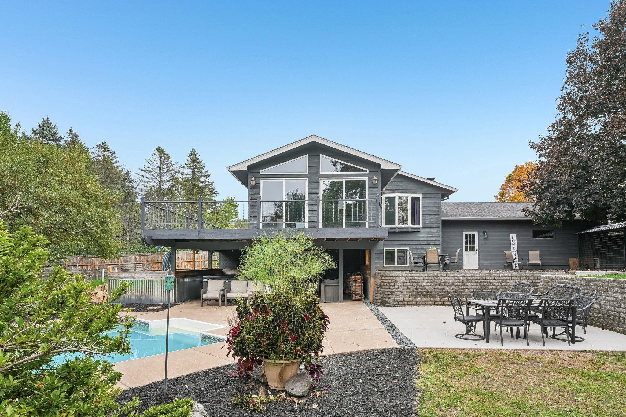 Inground pool and covered lower level porch
