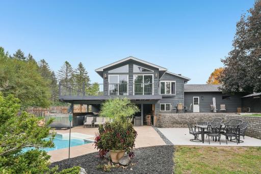 Inground pool and covered lower level porch
