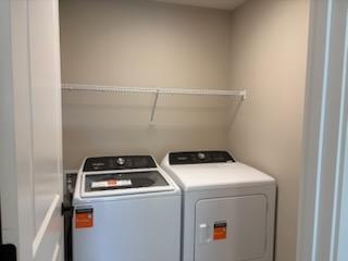 Convinent Upper Level Laundry w Appliances Included.jpg