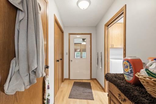 Hallway to the sun room, laundry/half bath, and garage