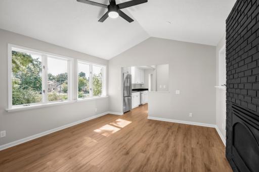 Main floor family room at the back of this lovely home looking towards the kitchen