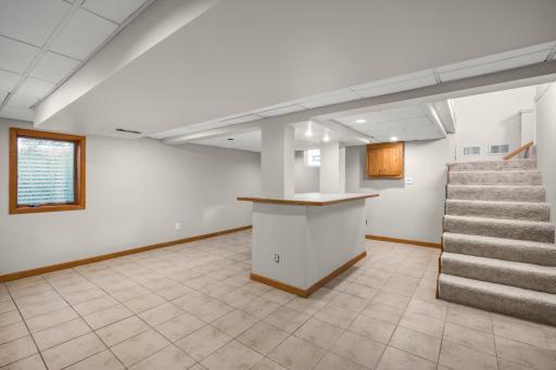 It's all extra space in the lower level since there's a large living room and family room on the main floor - egress window and 3/4 bath in the basement ...ready for your ideas