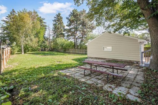 Privacy fence surrounds the enormous backyard - ideal for 4 legged family members, gardens and yard games with friends and family