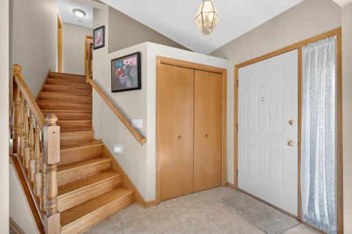 Step inside and be greeted by a beautiful staircase that instantly elevates the space with charm, elegance, and warmth.