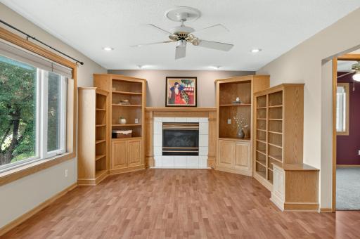 Whether hosting a crowd or enjoying a quiet movie night, the generous family room provides the perfect setting with elegant built-ins and a cozy gas fireplace.