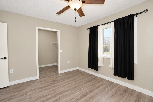 Primary Bedroom with Walk in Closet 2.png