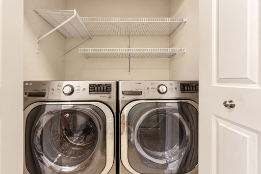Large capacity front load washer and dryer stay with this home!