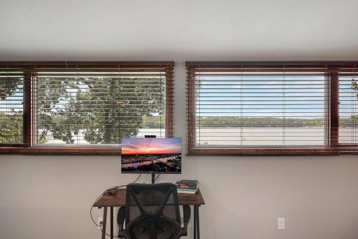 Much like the main floor, the primary bedroom has an unbelivable panoramic West facing view.