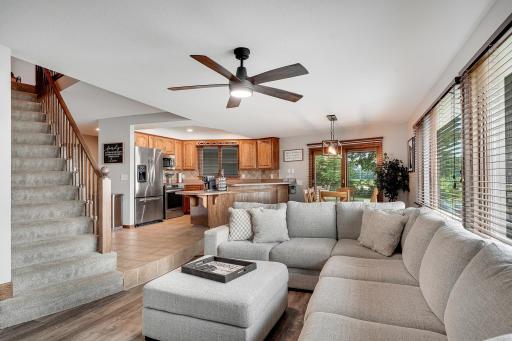 The open design flows great from one side of the house to the other. The sliding glass door leads out to the maintenance free wrap around deck.