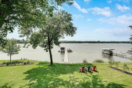 Unbelievable view from the uper level primary bedroom, a great way to soak in the reality of living on the lake.