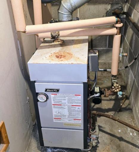 Boiler is located in closet in family room.