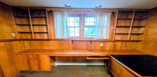 Built in desk, book shelves, and plenty of countertop space.