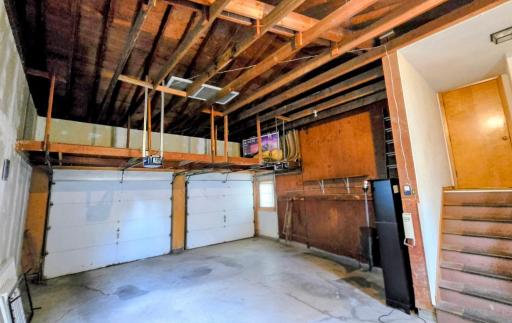 Attached double garage with overhead storage