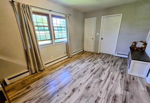 Plenty of room for dining table-updated flooring and paint interior.