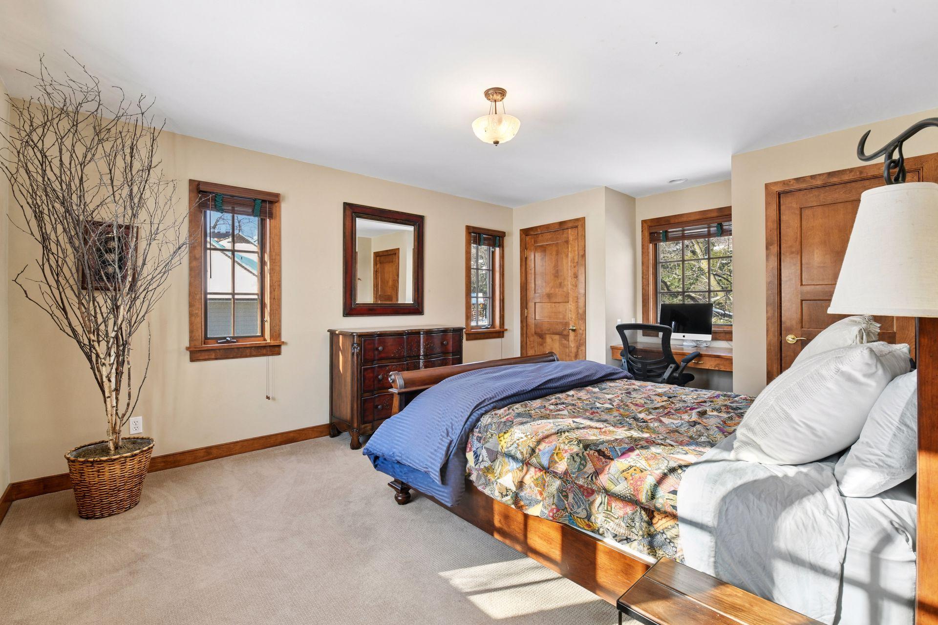 Multiple exposure, large, and also another bedroom with workspace