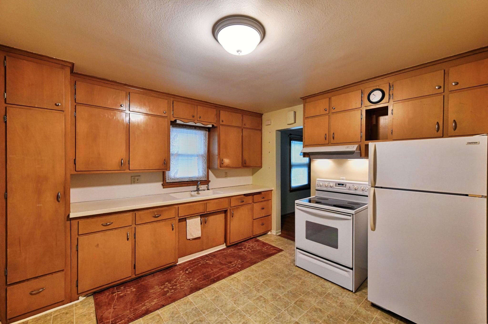 Kitchen has plenty of room for a table and chairs.