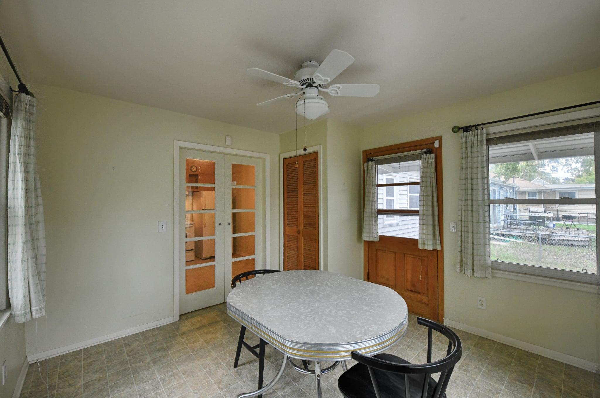 Check out the 4-season porch off the kitchen!
