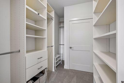 Generous walk-in closet provides abundant storage and complements the well-appointed secondary suite.