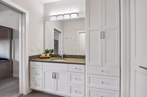 Private en-suite secondary bathroom features a separate shower and toilet area for added privacy and convenience.