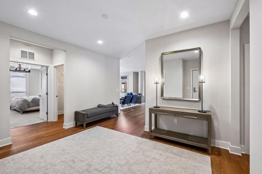 Step into a bright, spacious entry that opens beautifully to the rest of the home.