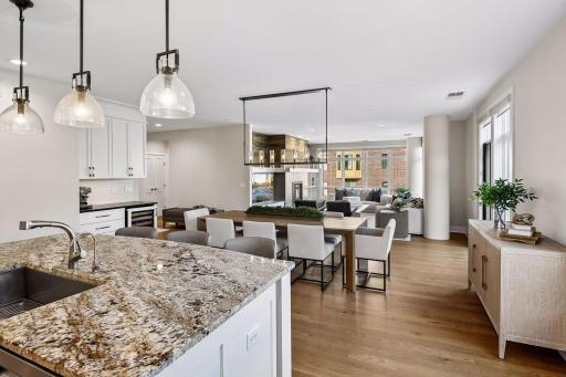 Kitchen features stainless steel appliances and an open layout that connects beautifully with the living and dining areas.