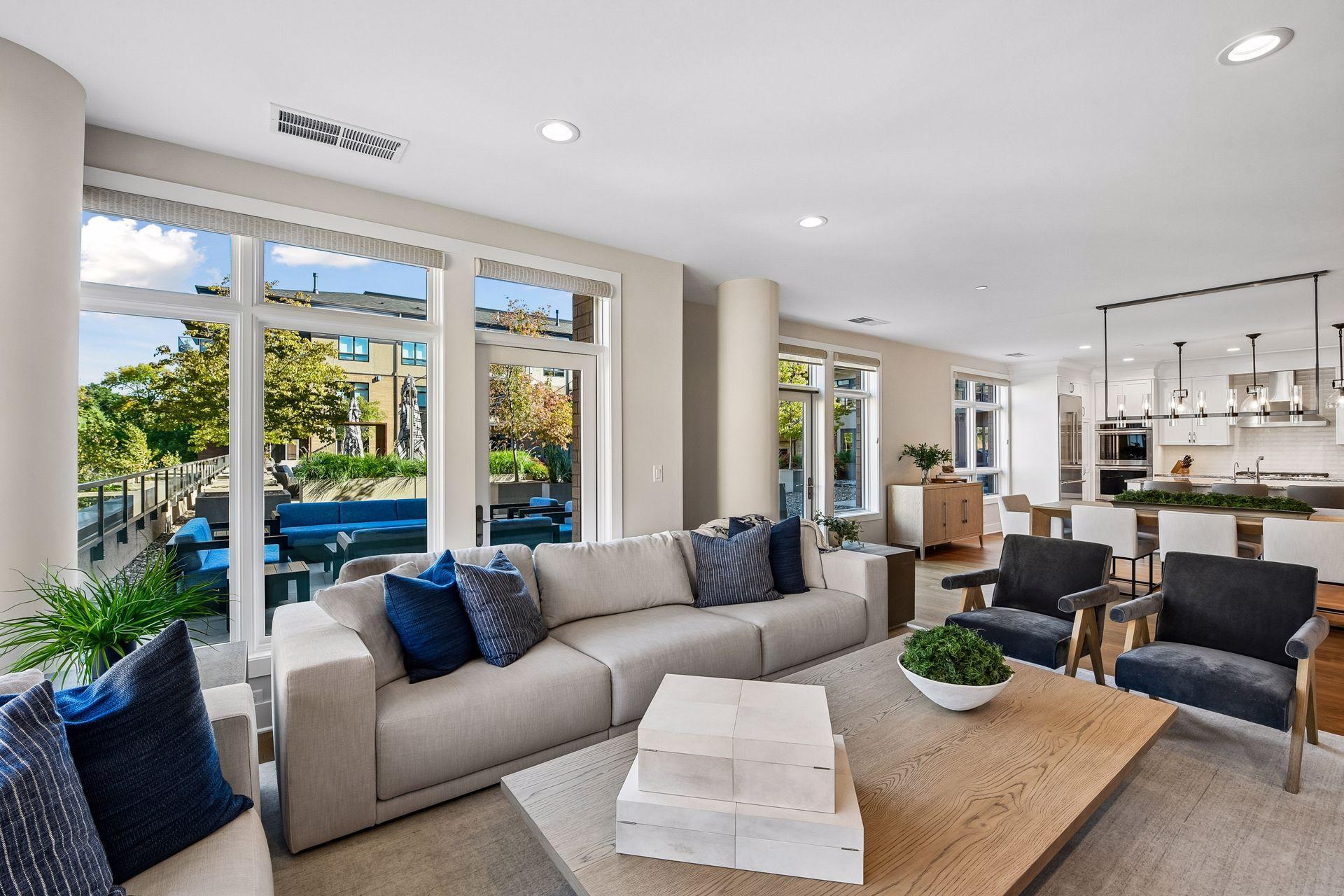 Welcome to Regatta #220, a spacious corner unit offering 2 bedrooms plus den w/ Murphy Bed, 3 baths, exceptional private outdoor space, and four adjacent parking spaces.