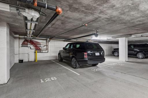 A rare offering, Unit 220 includes four side-by-side parking spaces. (126,125,124,123)