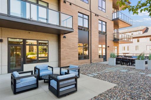 Two private patios totaling approx. 600 sq. ft. extend from the secondary suite and main living area, offering exceptional outdoor living.