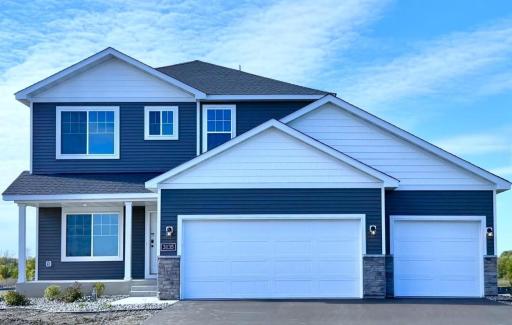 3135 Jandura Ave NE- New Construction Home ready for a Quick Move-in! Highlights include a 4 Bay Garage (934 sq. ft.) and Front Porch located on a Walkout Homesite! Sod will be installed soon.