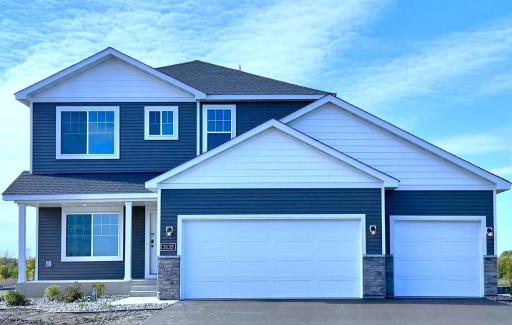 3135 Jandura Ave NE- New Construction Home ready for a Quick Move-in! Highlights include a 4 Bay Garage (934 sq. ft.) and Front Porch located on a Walkout Homesite! Sod will be installed soon.