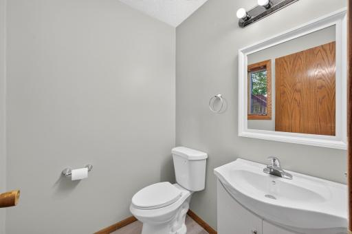 Convenient 1/2 bathroom just off the living room