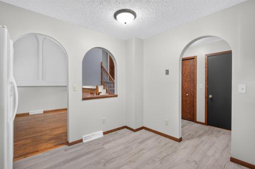 The kitchen is just off the front entryway to the home