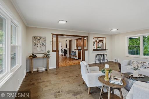 Pass through window to the kitchen allows for conversations and being in the know!