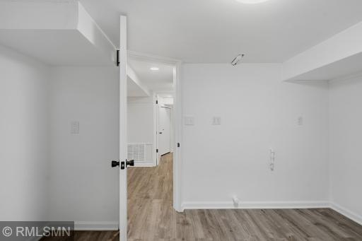 Large laundry room has plenty of usable storage space!