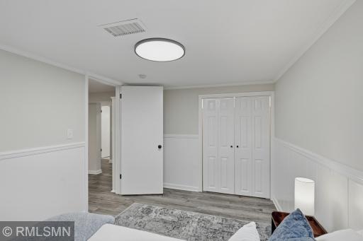 Re-imagined spaces throughout including this updated lower level fourth bedroom