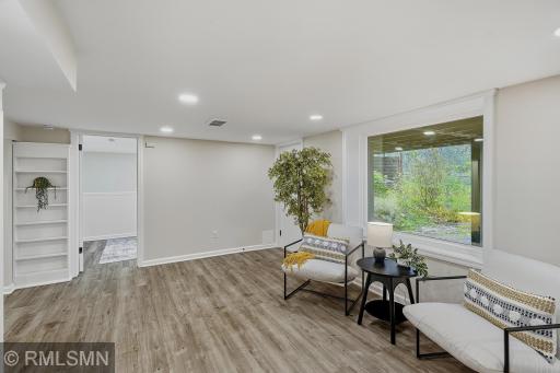 Lower level is a walk out basement with dutch doors leading out to the back yard (next to the picture window)