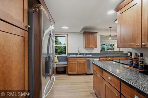 New kitchen floors tie in this magnificent remodeled kitchen