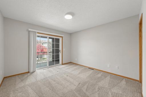 Primary bedroom suite on the upper level.