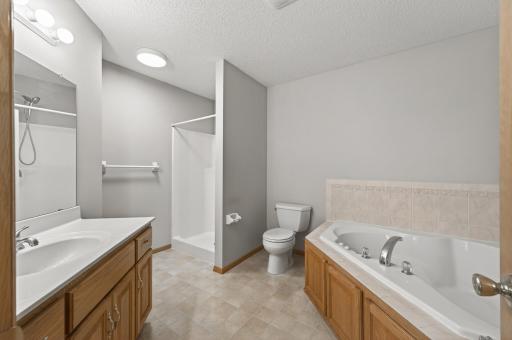 Primary bath with separate tub & shower.