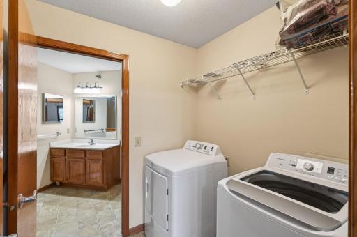 Laundry room accessible from both sides.