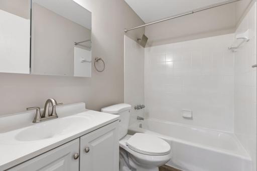 Primary full bathroom with shower and tub.