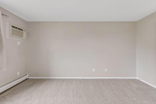Ample space for bedroom furniture, artwork, and personal items.