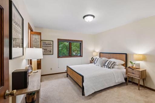 Owner's suite bedroom upstairs - has nice walk-in closet