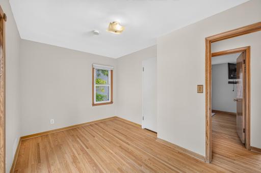 The 2nd main level bedroom makes for the perfect office, nursery, or kid's room!