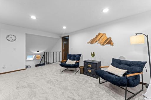 Upper level loft area - with freshly painted walls and carpet JUST installed